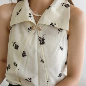 Sleeveless collared blouse xl